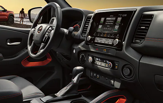 2023-nissan-frontier-interior-showing-front-seats-and-cockpit-v2.jpg